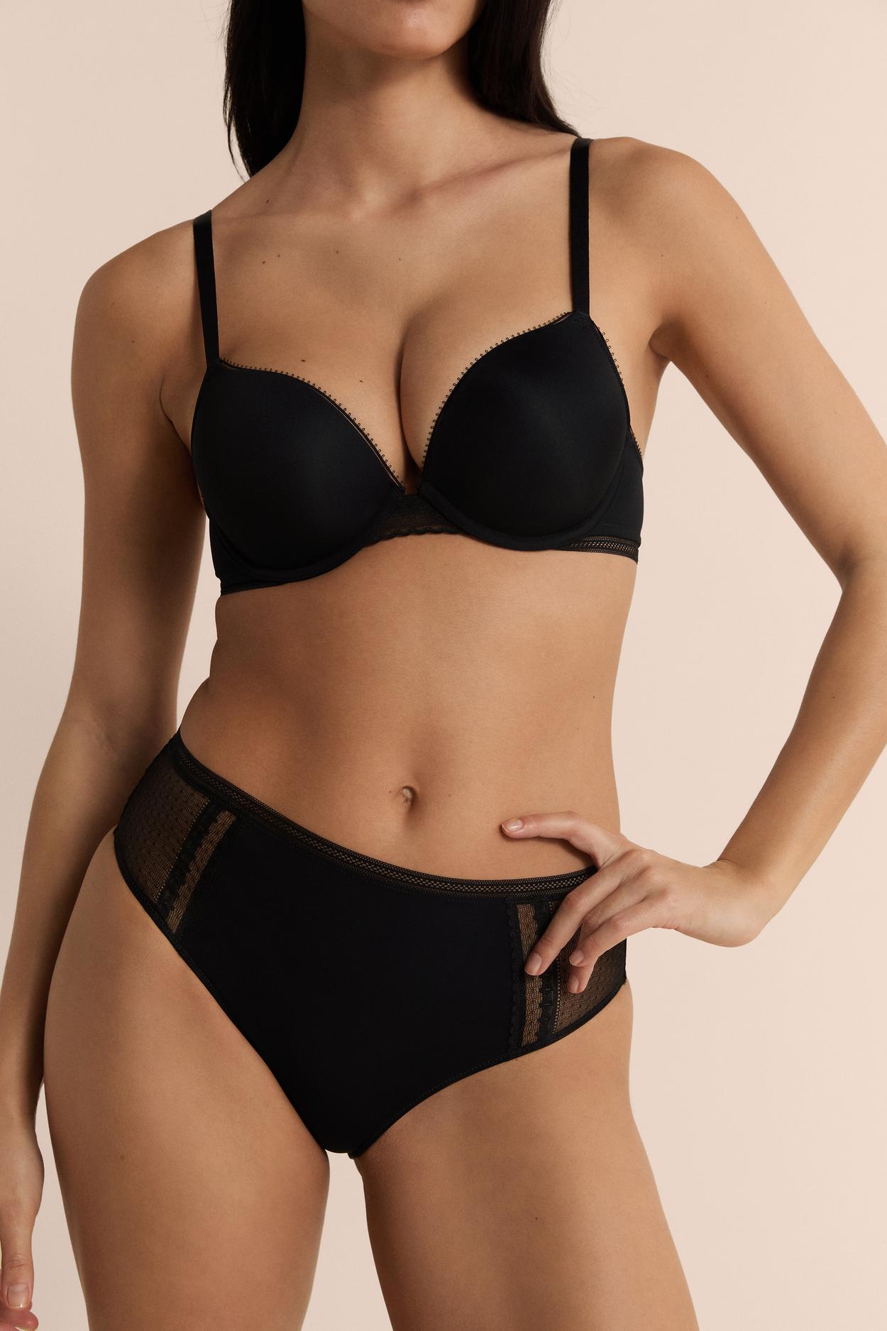 Spodnie midi z koronkowymi detalami